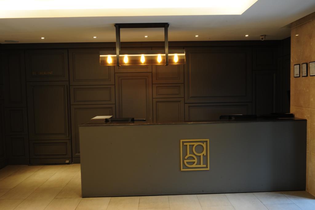 סוואן Hotel Tate מראה חיצוני תמונה